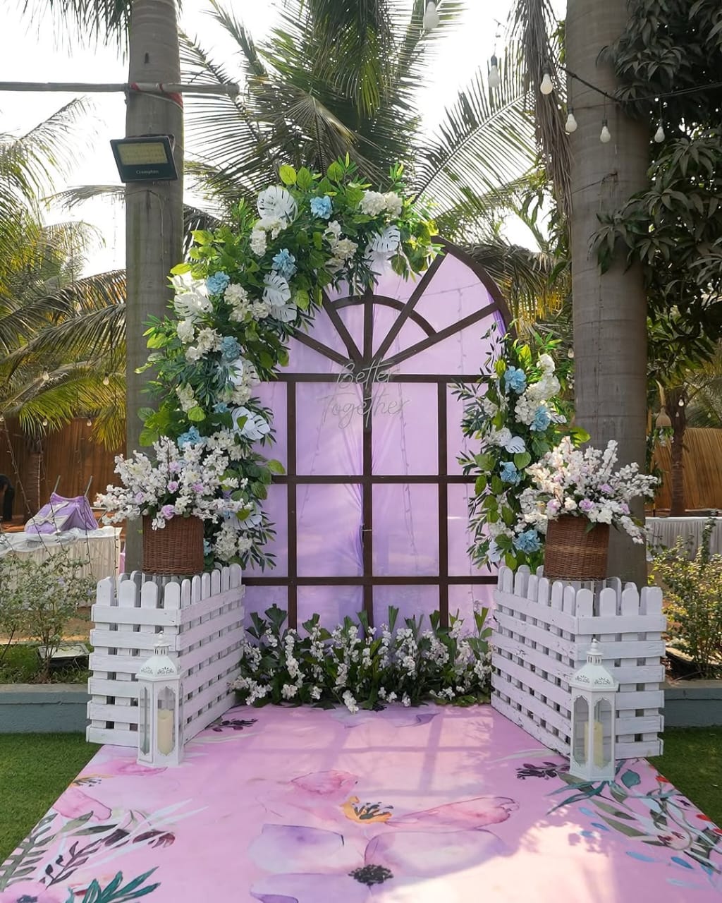 Purple Wedding Setup with Floral Backdrop