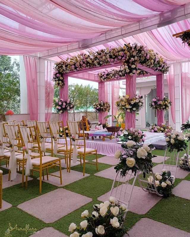 Pink-Themed Wedding Ceremony Under Pink Canopy